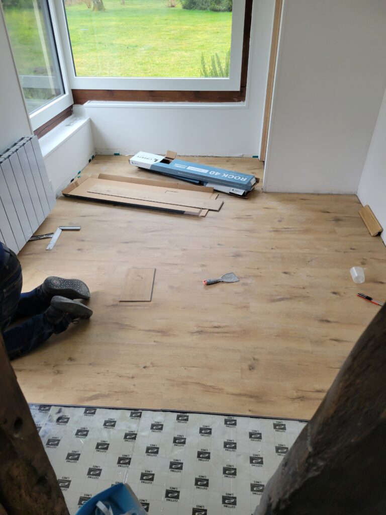 Installation de parquet stratifié à Le Neubourg