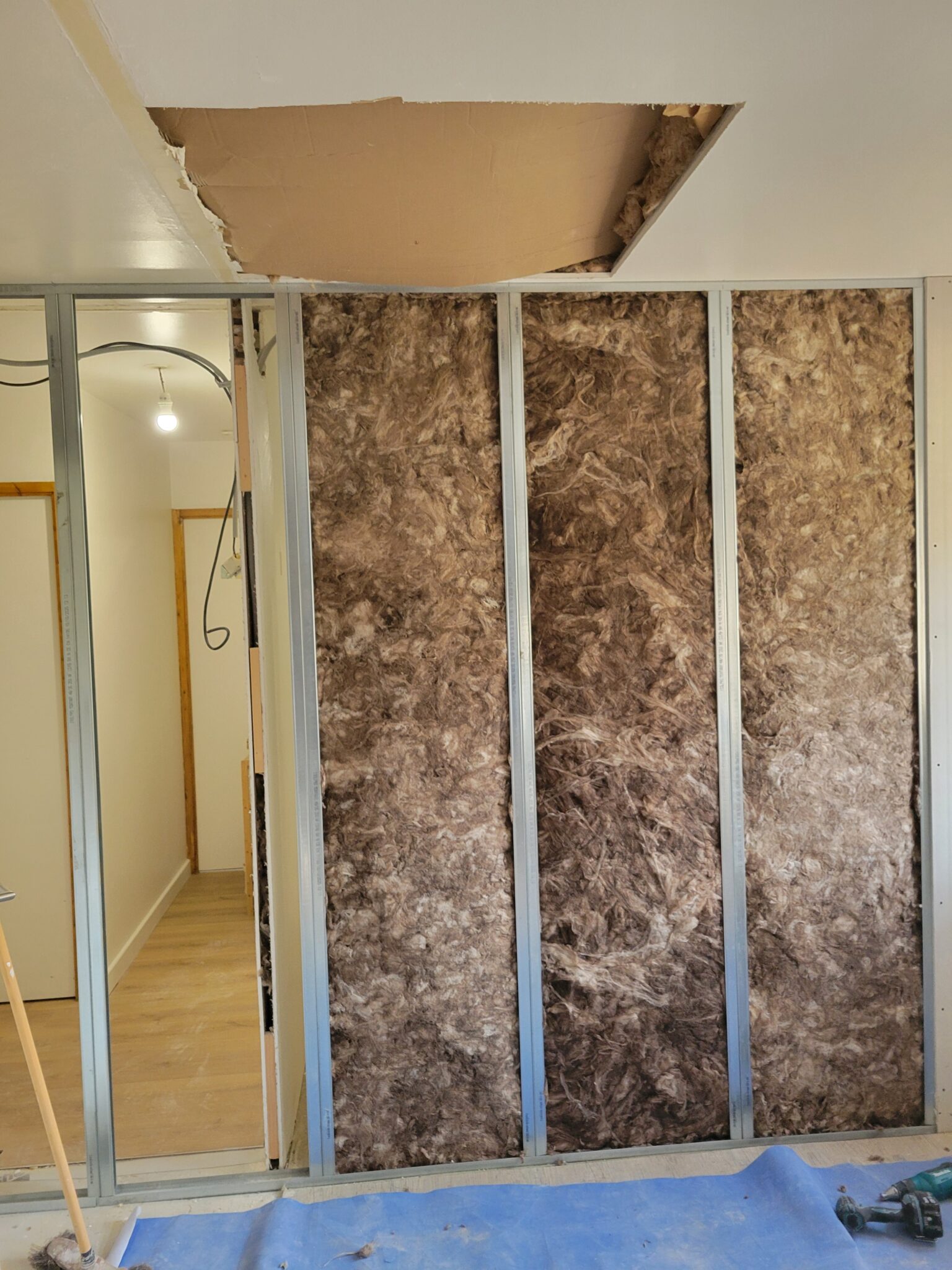 Installation de cloison isolée à Le Neubourg
