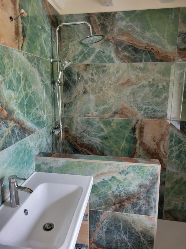 Installation de paroi de douche à Le Neubourg